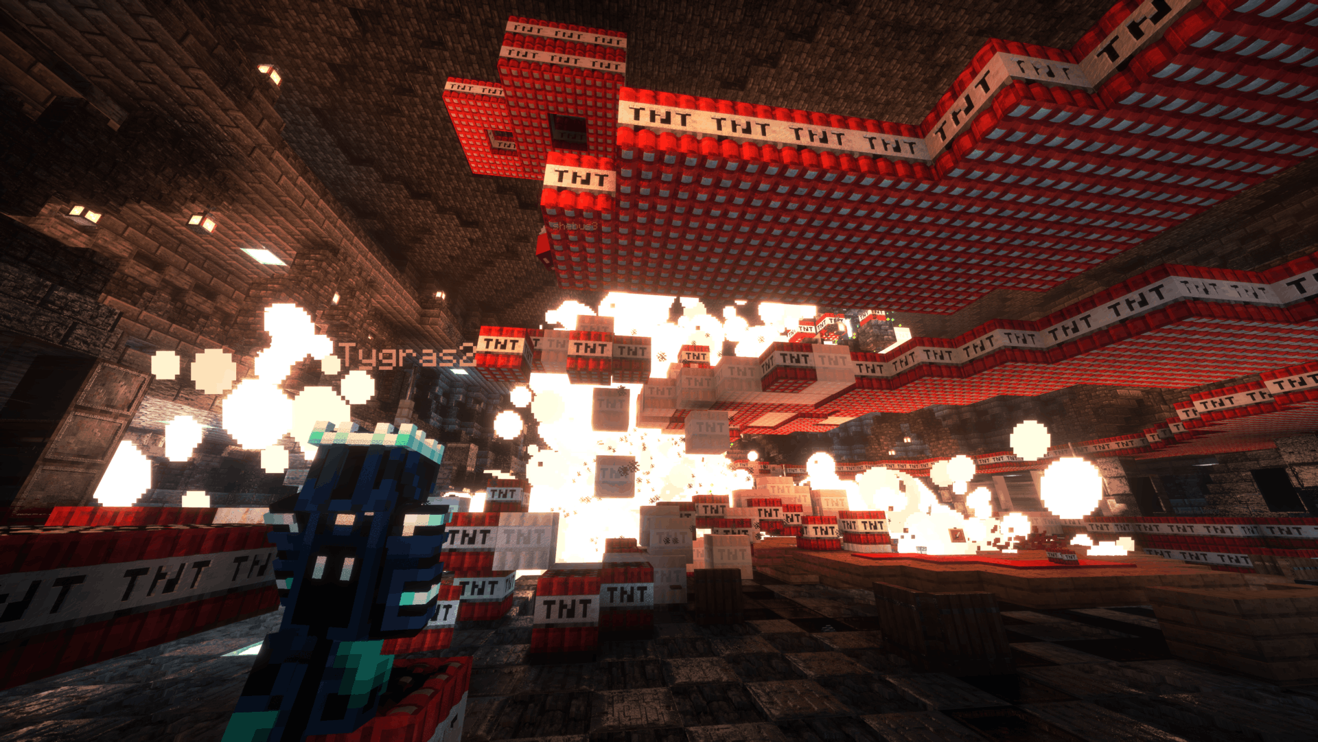 6b6t player Tygras2 watching a large TNT explosion inside a Minecraft structure