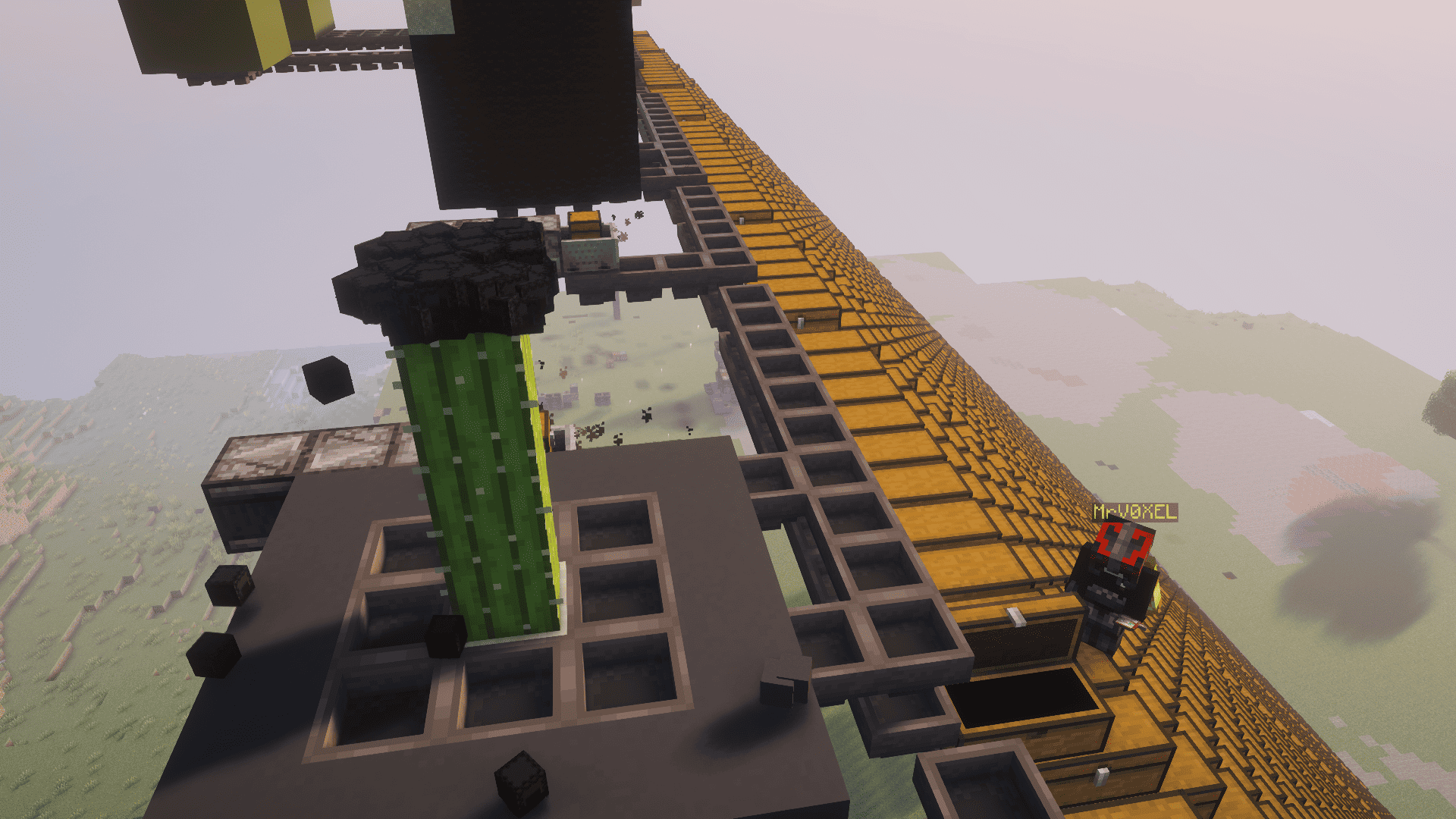 Minecraft player MrV0XEL standing beside a cactus duplication machine with hoppers, minecarts and rows of storage chests.