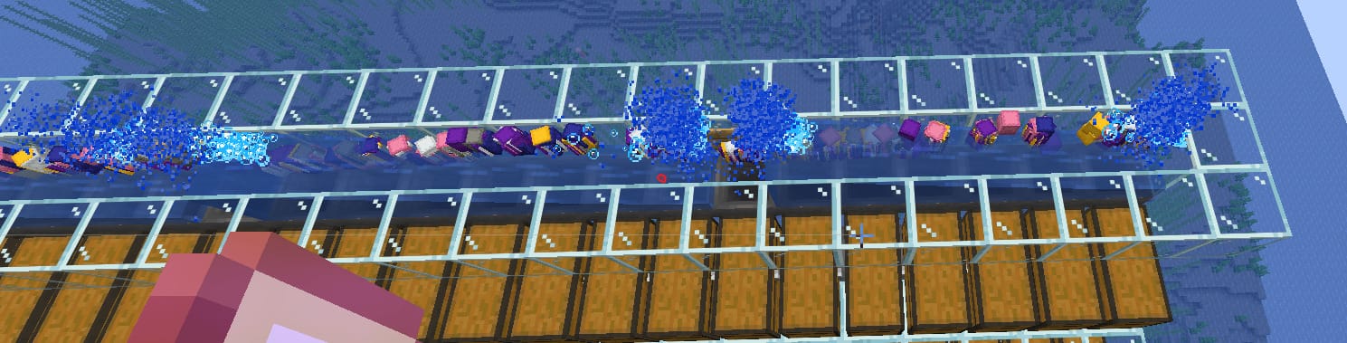 Rows of chests under water channels on 6b6t, with shulker boxes floating among them.
