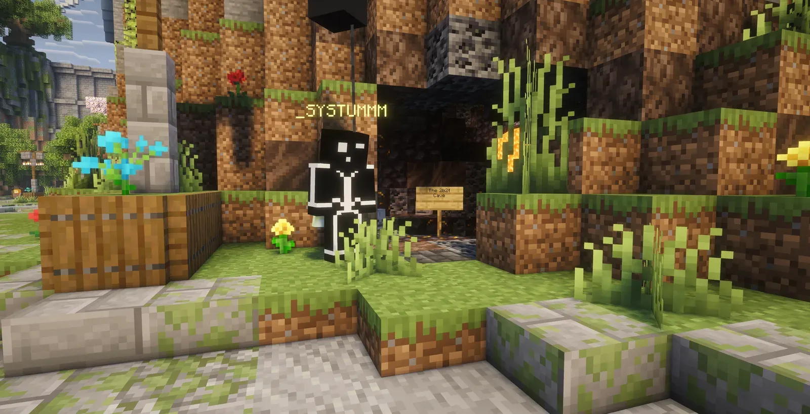 A player standing at a dark cave entrance in a grassy hillside, next to a small wooden sign