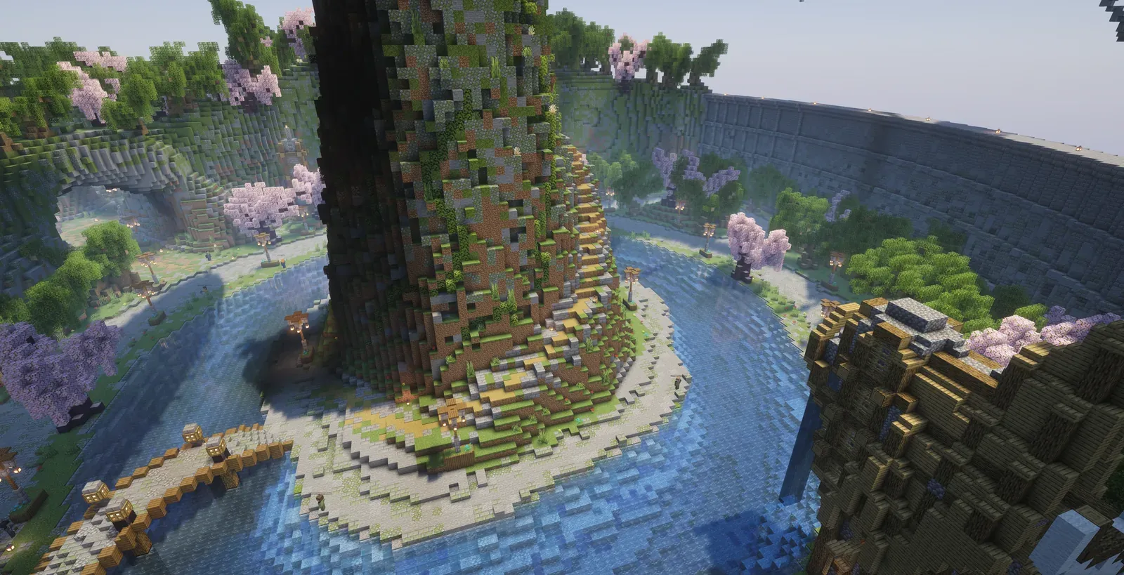 The tall mossy centre mountain rising from the water, with the race track around it and a round stone wall behind