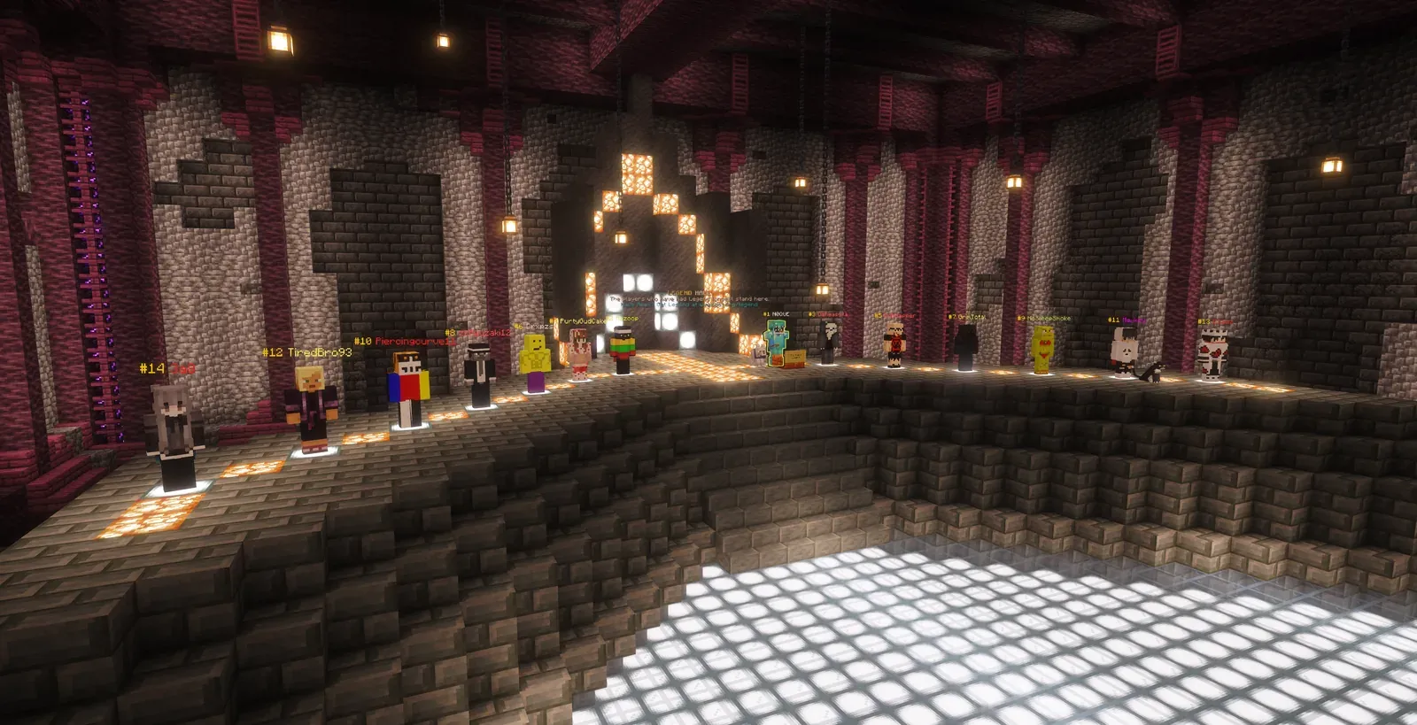 A row of lit statues of Legend players on a stone ledge above a glowing floor